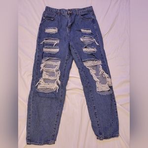 High-waisted ripped baggy blue jeans